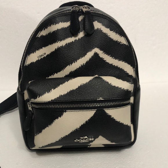 Coach Handbags - Coach Charlie Zebra Print Mini Backpack